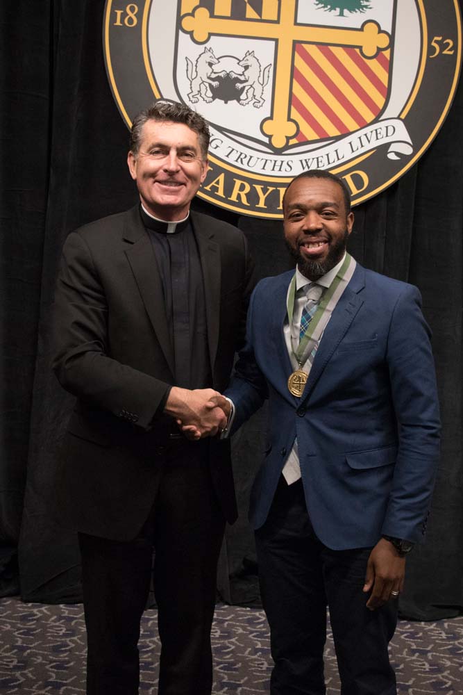Father Linnane and Sedrick Smith