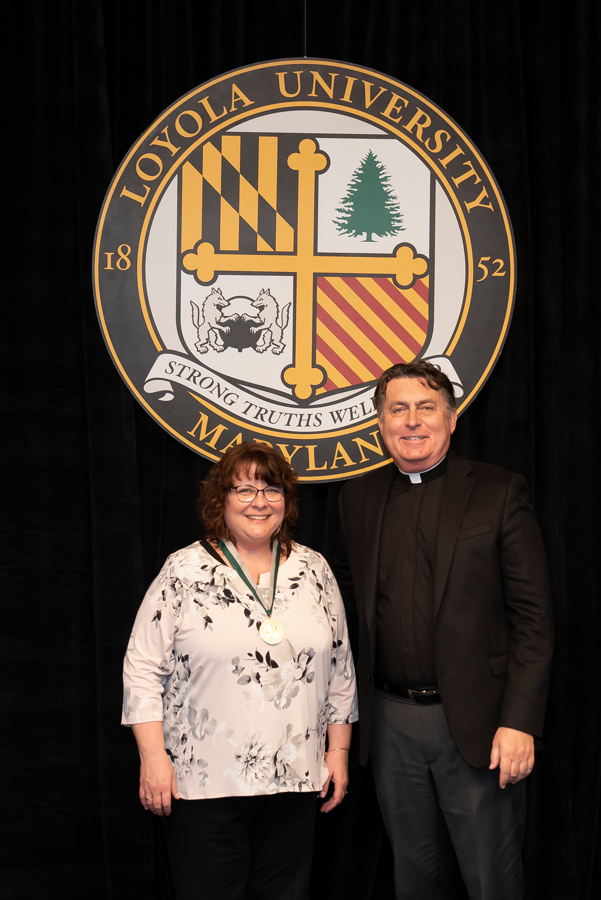 Patricia Holy Ilenda and Father Linnane