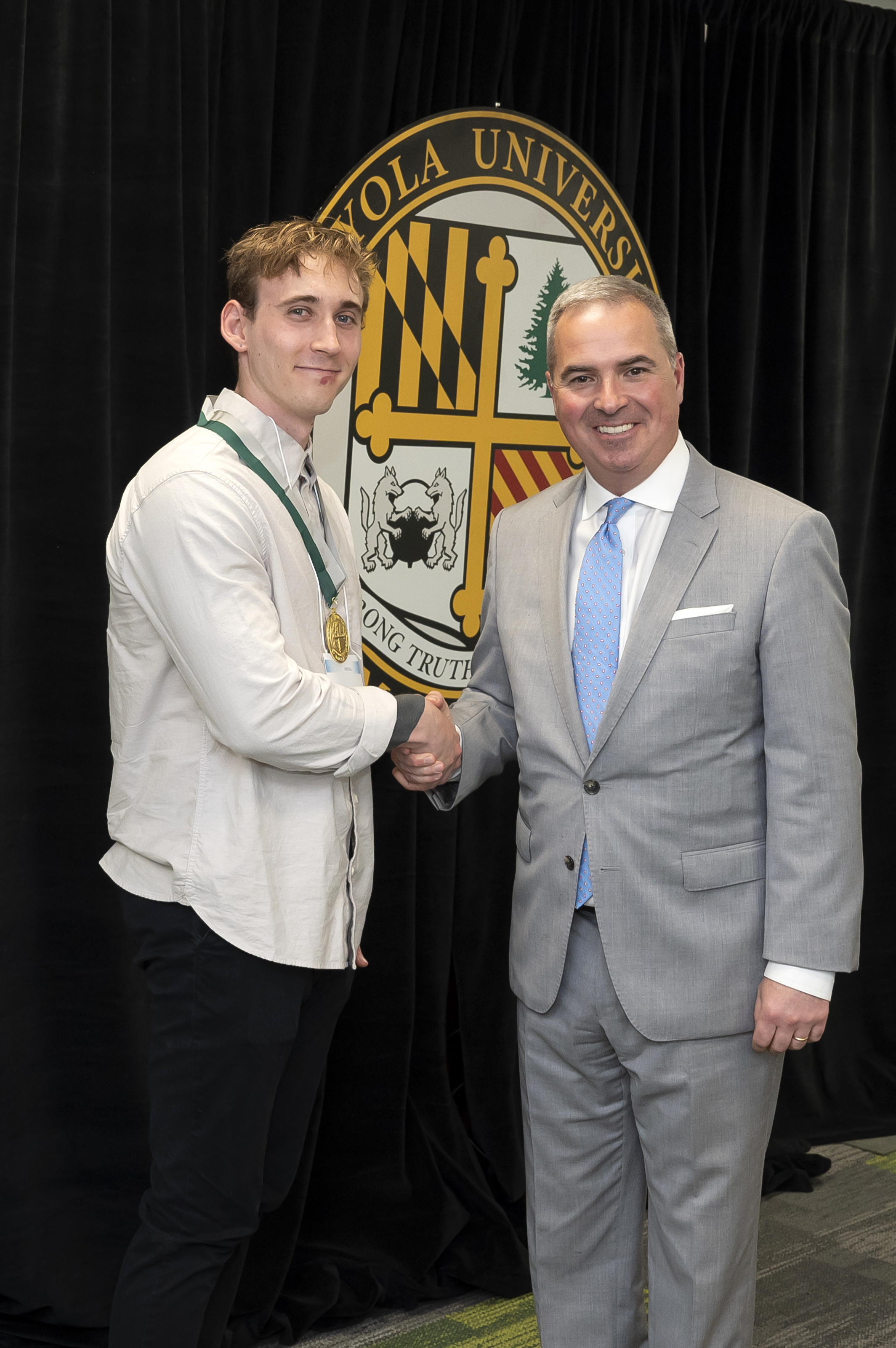 President Sawyer and awardee Emerging Scholars Celebration of Research, Loyola Univ. Maryland