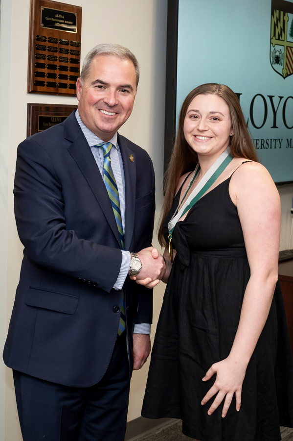President Sawyer and awardee Emerging Scholars Celebration of Research, Loyola Univ. Maryland