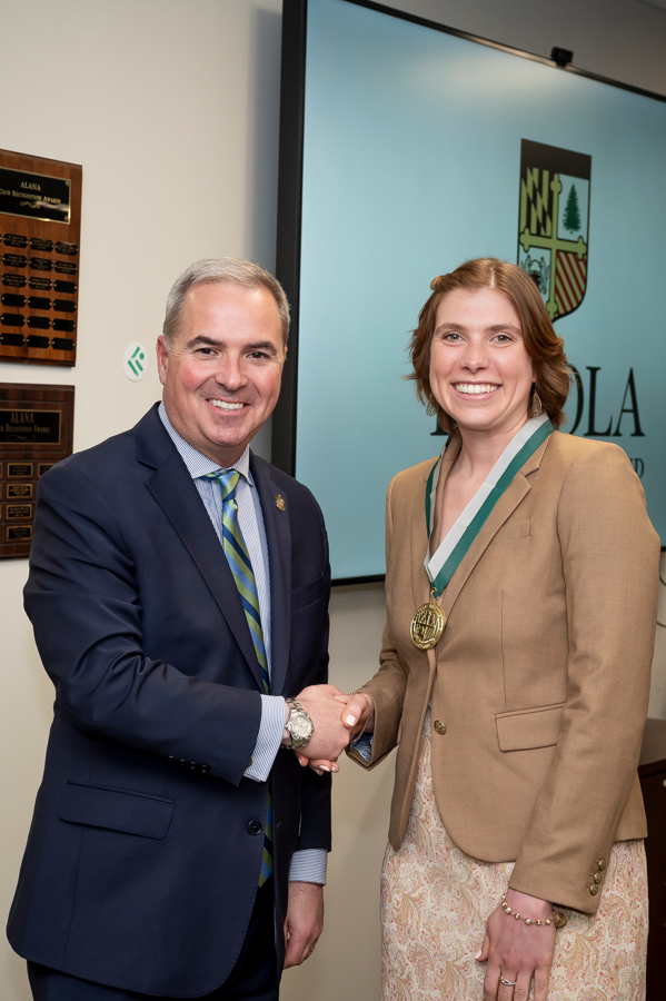 President Sawyer and awardee Emerging Scholars Celebration of Research, Loyola Univ. Maryland