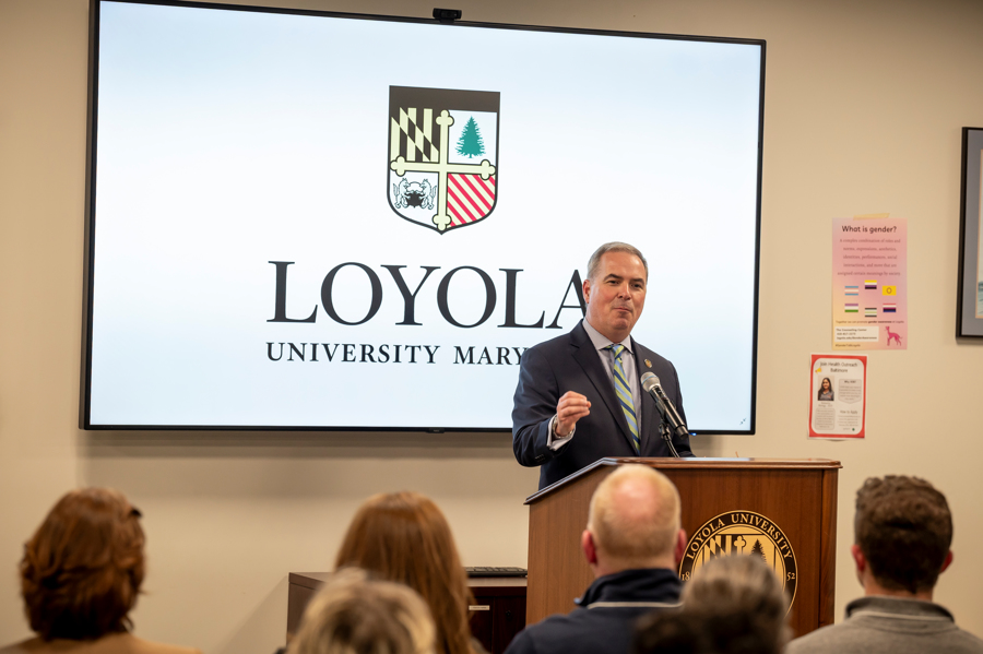 President Sawyer greets attendees at the Emerging Scholars awards ceremony