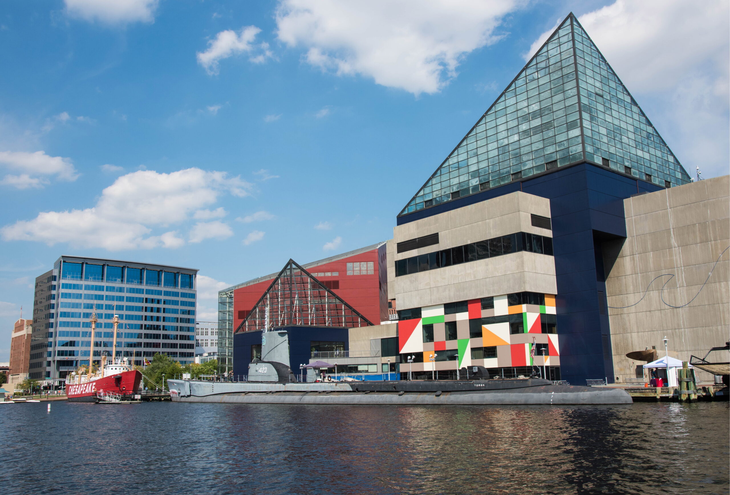 Baltimore's National Aquarium from the water on a sunny day