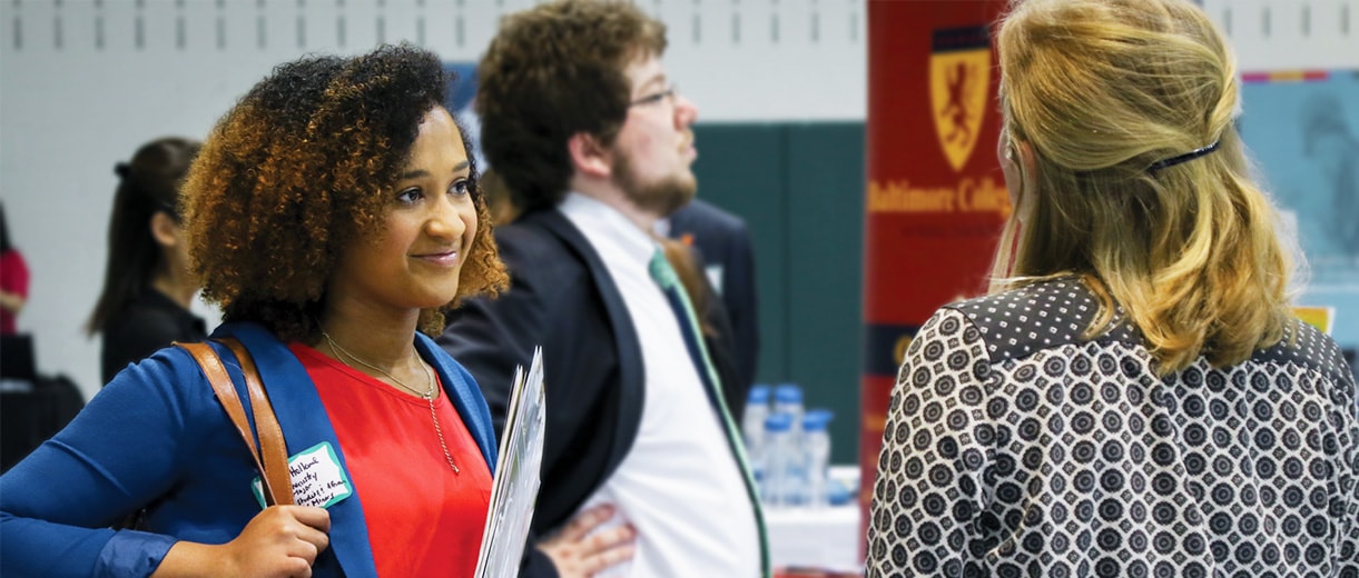 Loyola student at a career fair