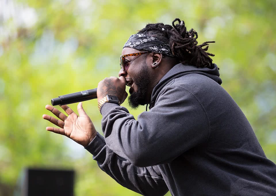 A performer singing on stage