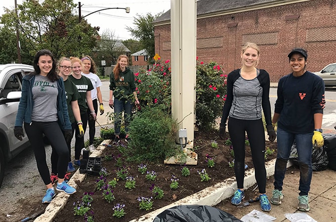 Loyola students completing clean up along York Road