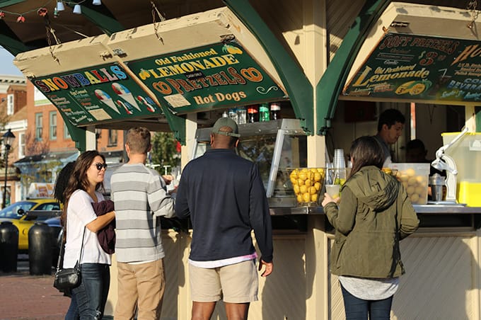 Students buying food from a food stand