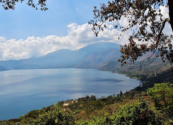 Large crater lake surrounded by wooded hills in western El Salvador