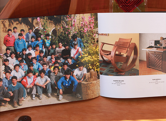 Photo of the artisan team and their furniture pieces in product book.