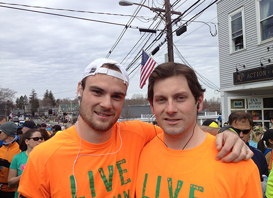 Brian De Sena and Dan Sweeney at the race wearing orange shirts.