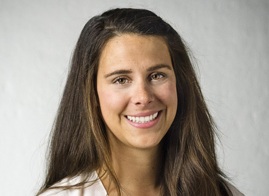 Peggy Sell smiles in professional headshot.