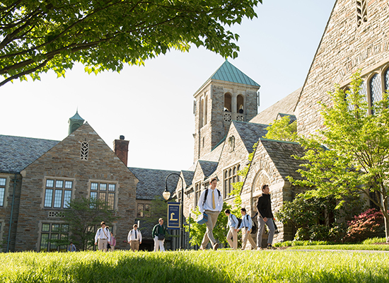 Loyola Blakefield's campus, illuminated by the sun as students walk through.