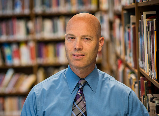 Photo of William Heiser at the library.