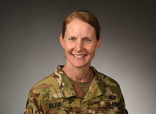 Lt. Col. Ammilee A. Oliva smiles, wearing her Army uniform in official portrait.