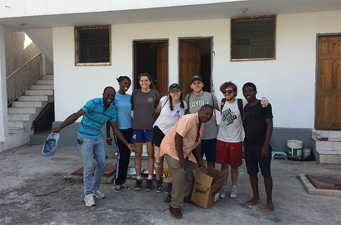 Fenal, Mirlaine, Mary, Julia, Raphael, Tyler, Samuel, and Claude in group photo.