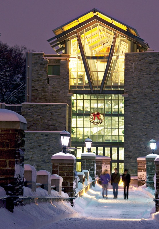 Exterior of the Sellinger School of Business decorated for Christmas