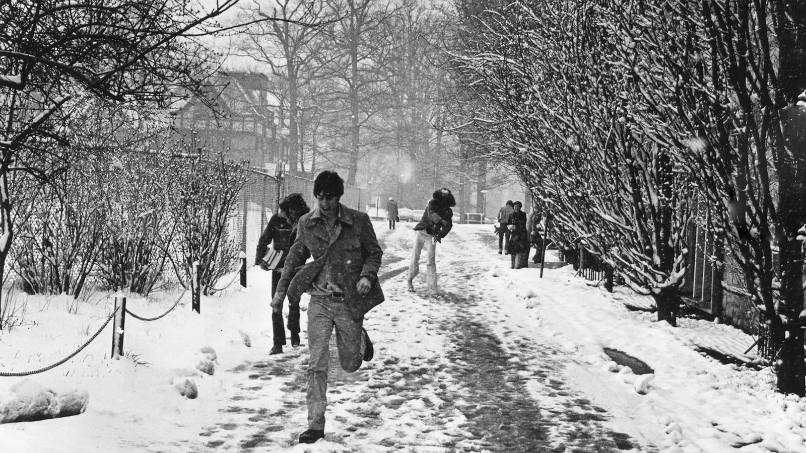 Loyola students having a snowball fight