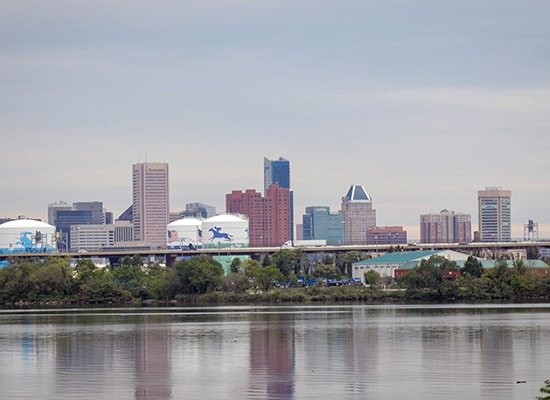 The Baltimore skyline with the Patapsco River in front of it