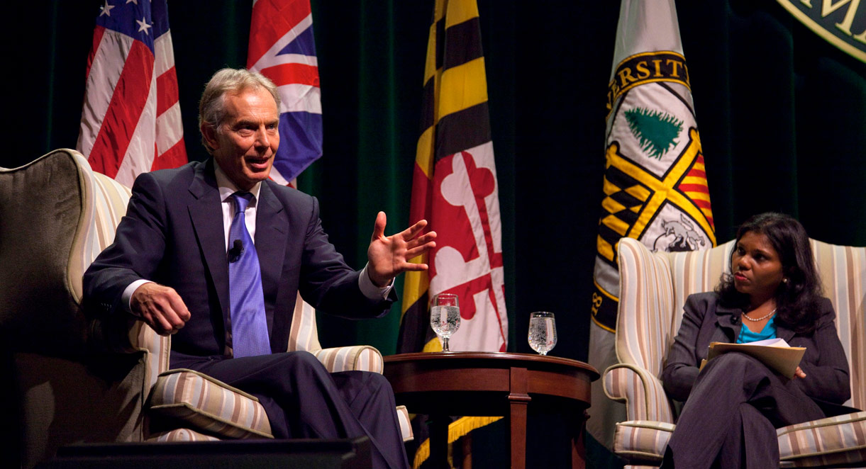 Tony Blair speaking on stage during the Hanway Lecture