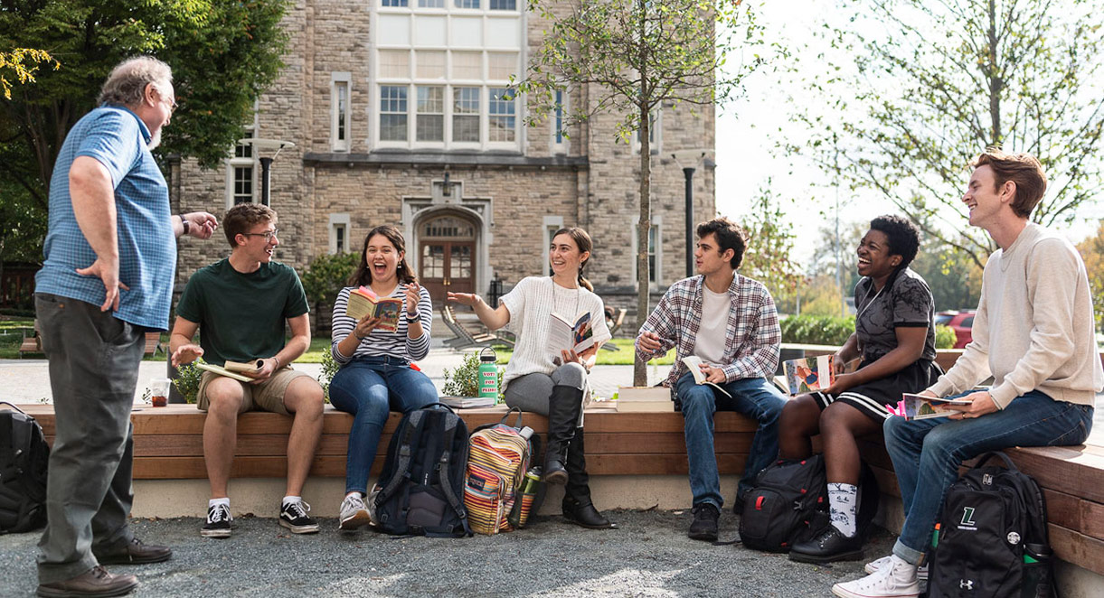 Students sitting in a outside during class