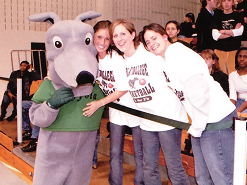 Three students pose with Iggy in 2003