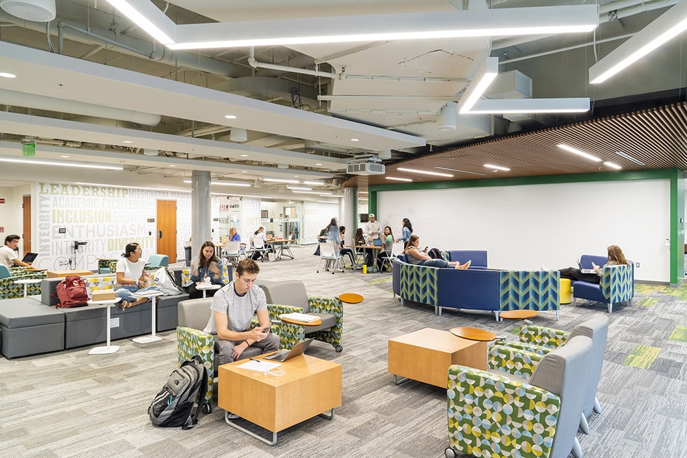 Students sitting and studying in one of the lounges in the student center