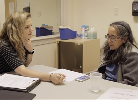 Speech-Language-Hearing Student working with an individual