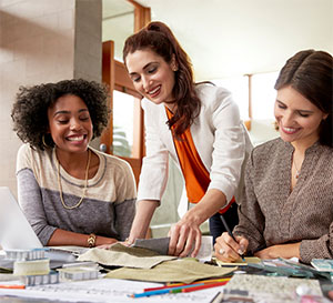 Three young educators working together