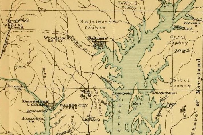 A yellowed, historical map of land surrounding the Chesapeake Bay with notations about properties owned by the Jesuits.