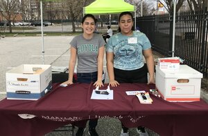 Loyola students at the expungement clinic table 