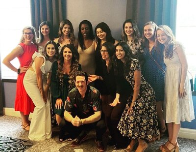 Thanusha Neelapareddy, PsyD '22 (pictured in middle row, far right) with her fellow PsyD graduates at the reception on graduation eve.