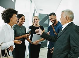 Students talking with professor