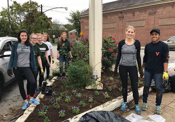 Loyola students completing clean up along York Road 