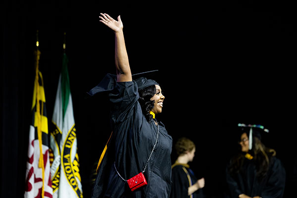 graduate student celebrates at commencement