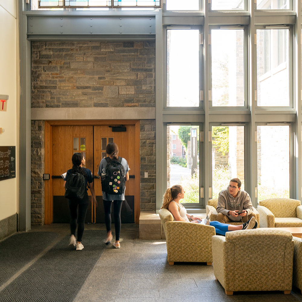 Loyola students inside the Sellinger School of Business and Management