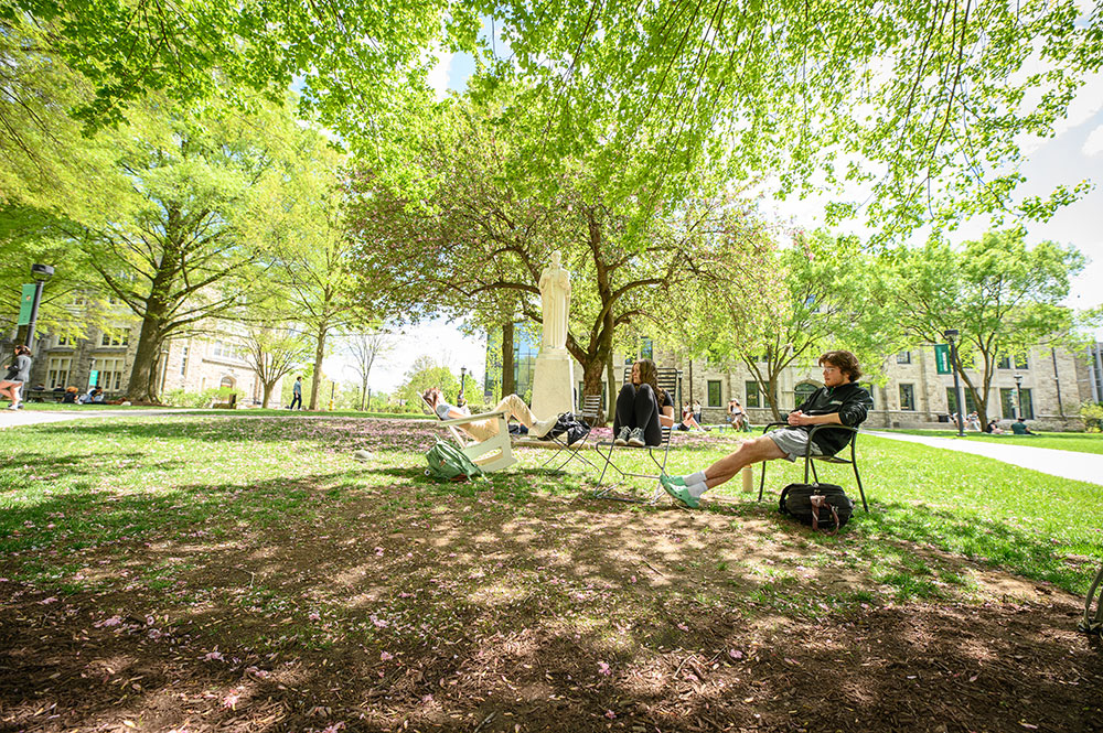 Students enjoying the Quad on Loyola University Maryland's Evergreen campus.