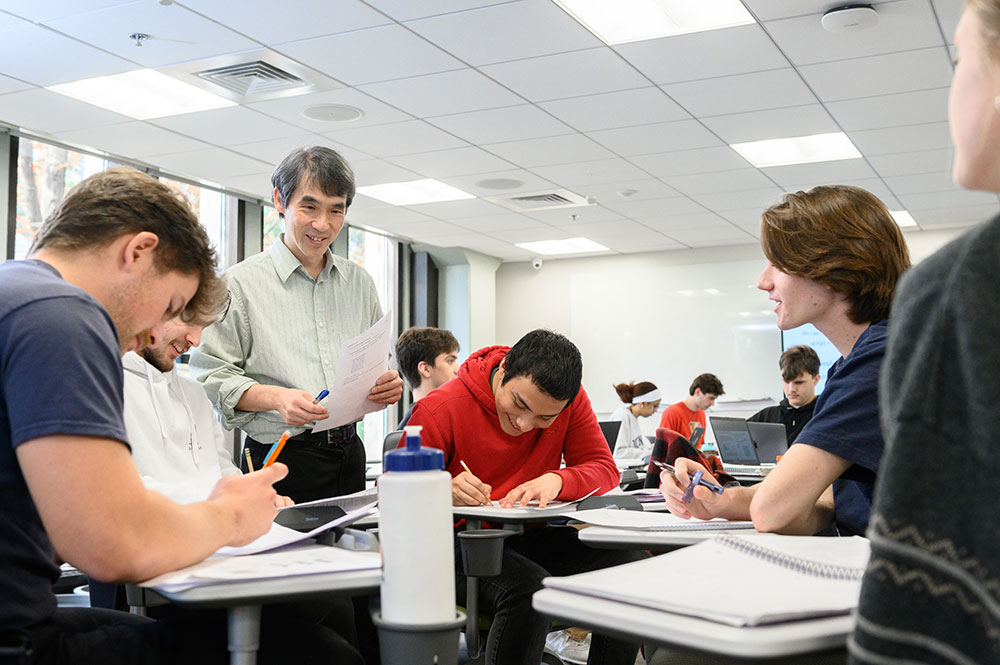 David Hoe, Ph.D., associate professor of engineering, teaching a quantum computing class in Fall 2024