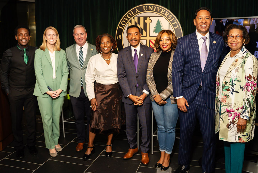 From left to right: Dr. LaMarr Darnell Shields, Maryland Comptroller Brooke Lierman, Loyola President Terrence Sawyer, Dr. Kaye Whitehead, Congressman Kweisi Mfume, Councilwoman Phylicia Porter, Baltimore City State's Attorney Ivan Bates, ASALH Executive Director Sylvia Cyrus (courtesy of Trevor Fortier, IISHOOTFILMS Productions)