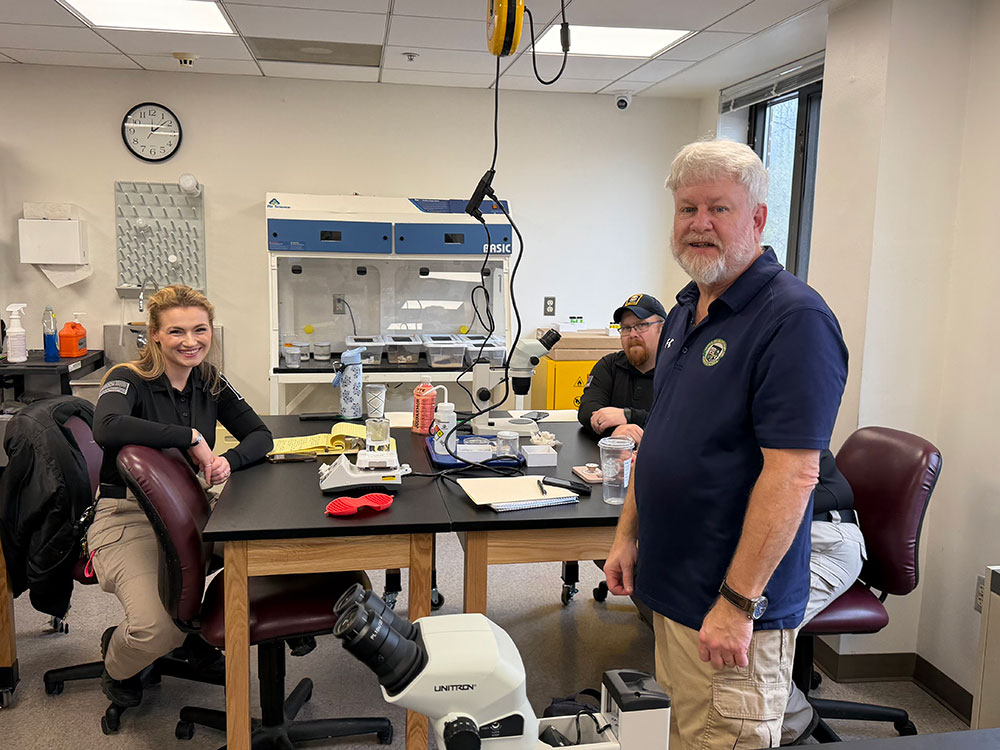David Rivers, Ph.D., chair and professor of forensic science, leading a training workshop with the evidence collection kits provided through the grant from Show Your Soft Side