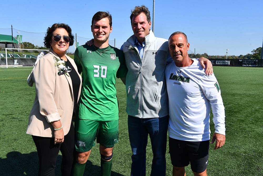 Jeffrey A. Nattans, ’89, a member of Loyola University Maryland’s Board of Trustees with his wife and son, Spencer