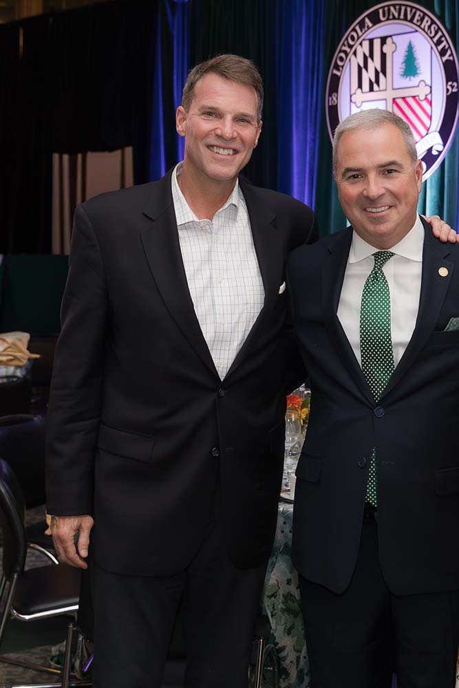 Jeffrey A. Nattans, ’89, a member of Loyola University Maryland’s Board of Trustees with President Sawyer