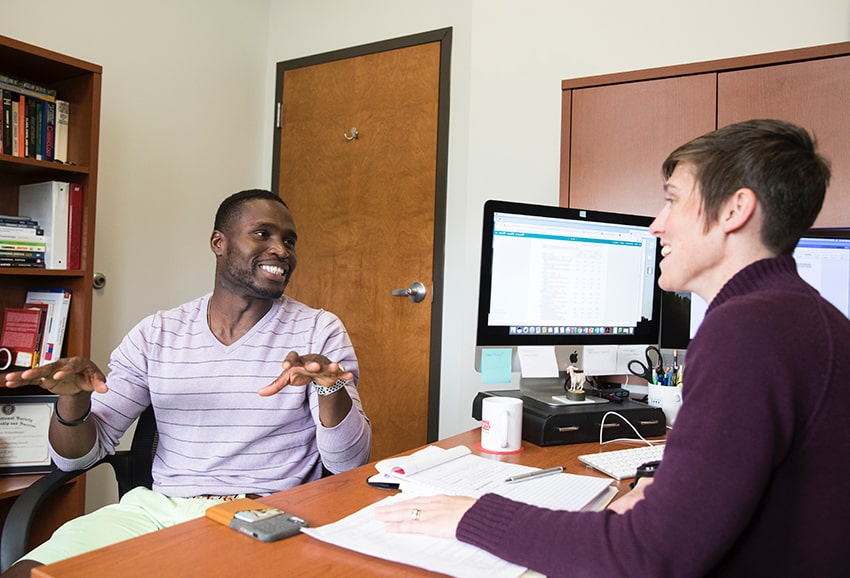 Loyola graduate student meets with department to discuss upcoming courses