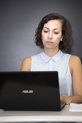Student in front of laptop