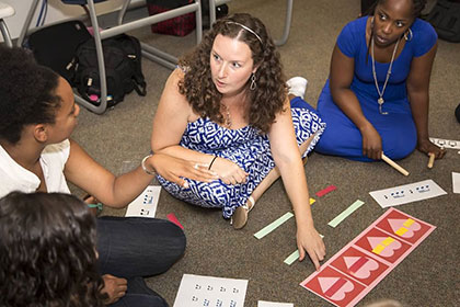 Loyola students working with children