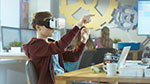 Student using virtual reality glasses in the classroom