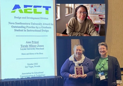 Three women posing with the award for Outstanding Practice by a Graduate Student in Instructional Designe