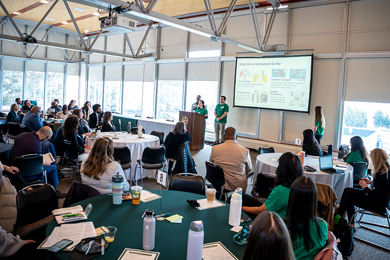 COI members present research.