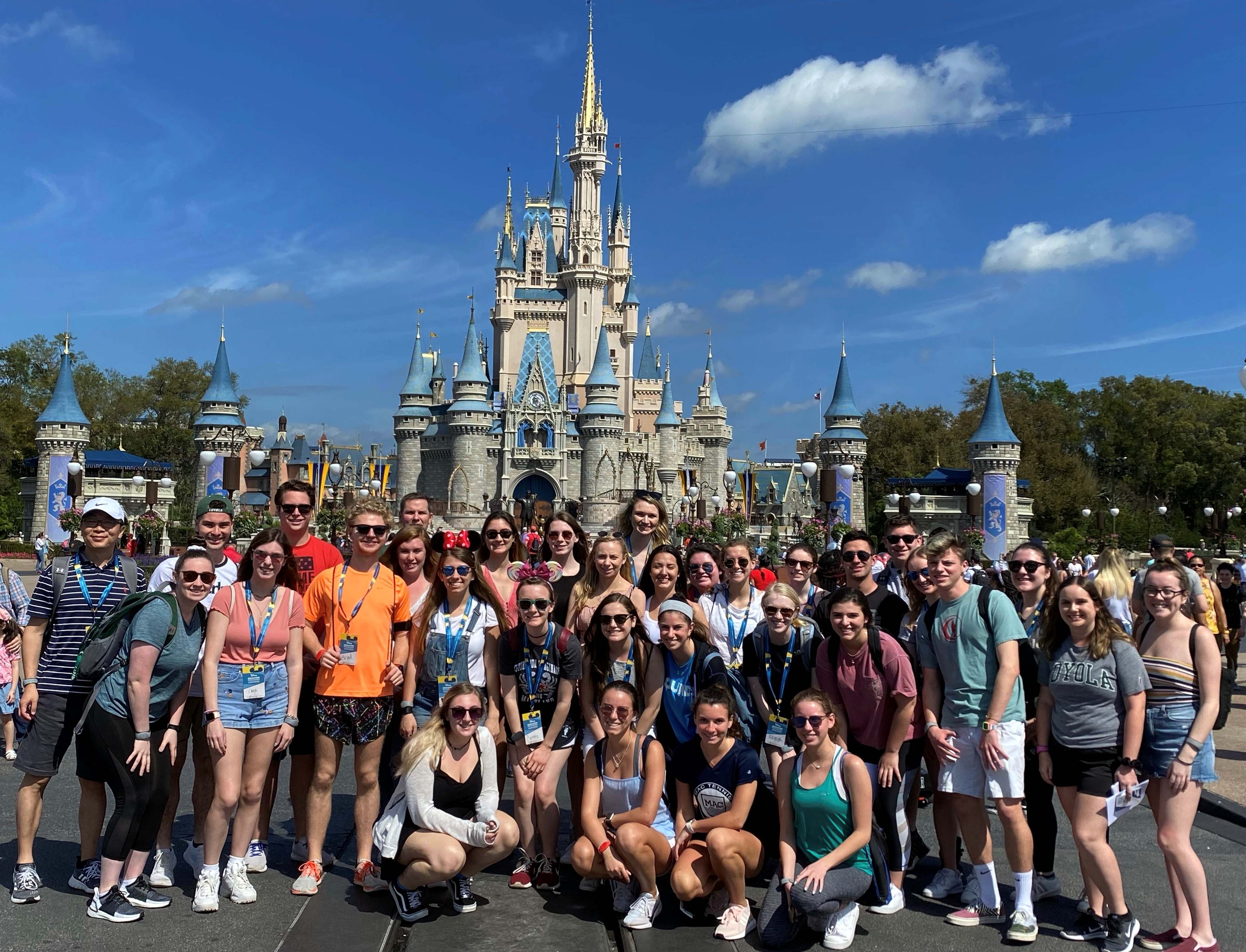 Group of Loyola students in front of Cinderella's Castle