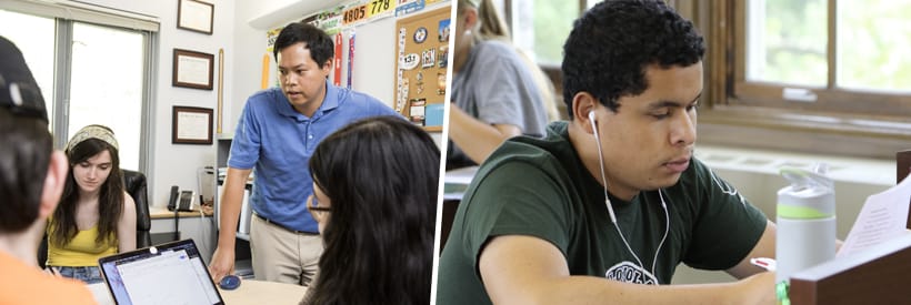 Students working at computers with faculty guidance