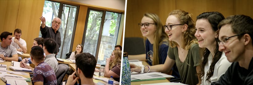 A professor pointing and students in class